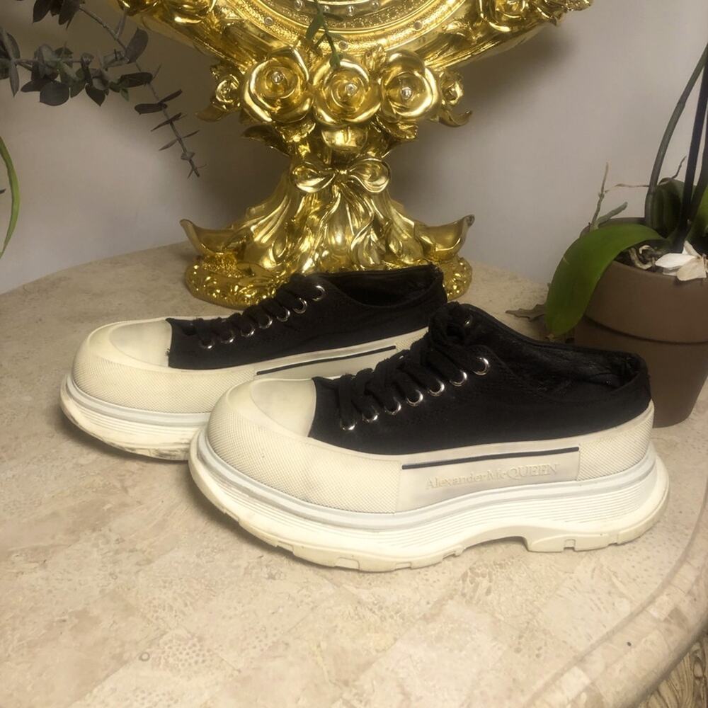 Alexander McQueen black and white platform chucks.